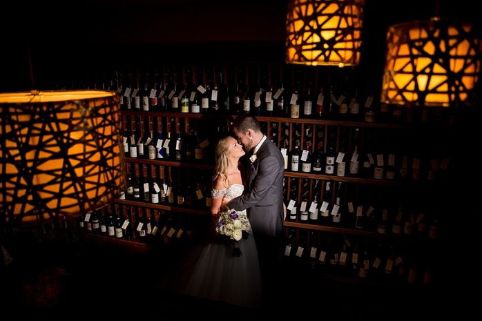 Joyful bride and groom walking hand-in-hand during their wedding at the Inn at Leola Village in Lancaster, PA.